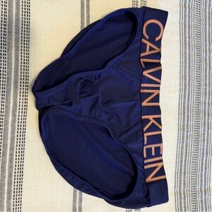 Calvin Klein Navy Briefs with Orange Logo Waistband